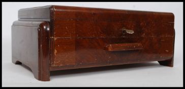 An early 20th century / 1920's - 30's cased canteen of cutlery, fully appointed interior,