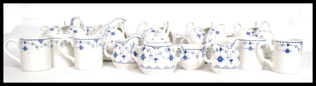 An extensive blue and white Johnson Brothers dinner service in the Denmark pattern,
