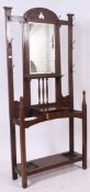 An excellent Victorian Ars & Crafts oak hallstand in the manner of Liberty.