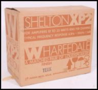 A pair of original vintage Wharfedale Shelton teak speakers being  complete in the original box.