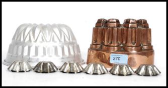 A Victorian / Edwardian  copper jelly mould with inscription to the front along with another jelly