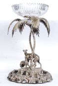 A 19th century Victorian silver plate centrepiece being modelled as a pair of greyhounds beneath