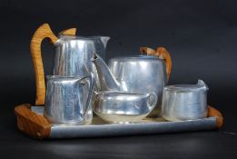A 1950's Piquet Ware 6 piece service to include tray, teapot, creamer,