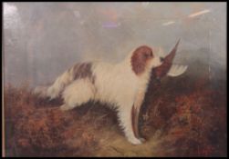 J Langlois ( Born 1800 ) A framed oil on canvas painting of a gun dog - retriever with pheasant in