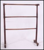 A Victorian mahogany towel rail stand.