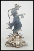 A 20th century white metal Indian (tests as silver ) candlestick holder stand,