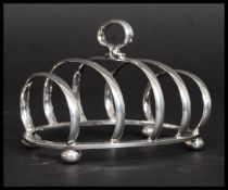 A silver hall marked  for Birmingham Toast Rack stamped for G Unite & Sons & Lyde Ltd with a date