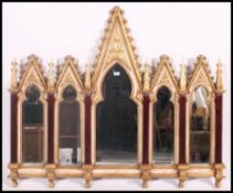 An two toned painted shabby chic and parcel gilt Gothic revival style compartment overmantel wall