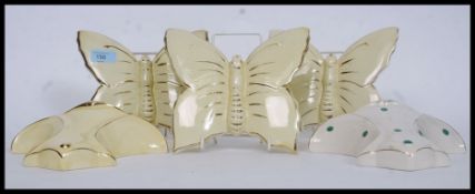 A collection of early to mid century wall pockets,