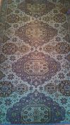 A 20th century Persian rug of unusual blue and black form with central blue / turquoise ground and