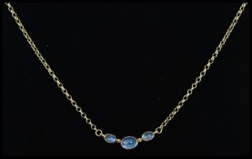 A 9ct gold and moonstone set pendant and necklace chain.