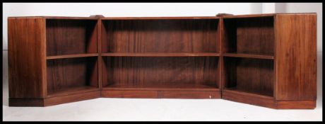 A retro mid century modular sectional Danish influence bookcase, having adjustable shelving,
