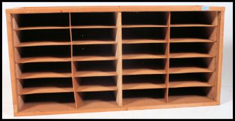 A retro 20th century  industrial scratch built pigeon hole stationary office cabinet having twenty