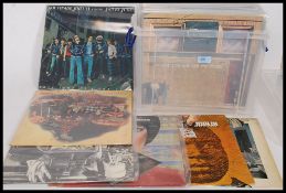 A collection of Long Play ( lp's ) vinyl records of various genres and artists such as John Handy,