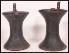 An unusual large pair of 19th cenury Cast iron ships rope ties in black - believed to be from