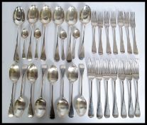 A Victorian extensive silver hallmarked cutlery set. Comprising forks, table spoons, teaspoons etc.