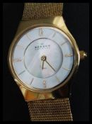 A ladies decorative yellow metal Skagen - Denmark dress watch.