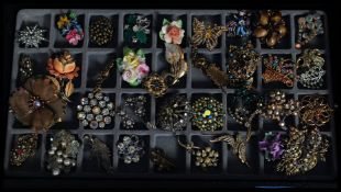 A fabulous collection of  37 costume jewellery brooches to include stone set, glass peacock,