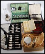 A collection of flatwares to include boxed cutlery, Victorian leather jewellery box.