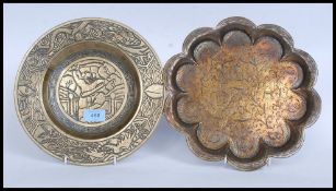 A good early 20th century heavy brass Oriental charger plate,