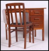 A 1940's Air Ministry style clerks desk with open kneehole recess and single pedestal of drawers.