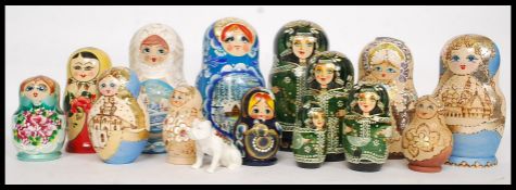 A collection of 20th century Russian made graduating wooden dolls, each fitting inside another,