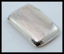 An Edwardian silver hallmarked cigarette case with makers marks FF in two diamonds.