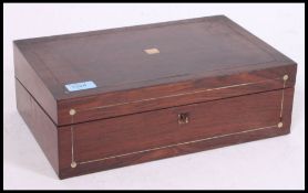 A 19th century Victorian rosewood and brass bound writing slope.
