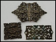 A charming hallmarked silver nurses belt buckle along with an unmarked but likely silver nurses