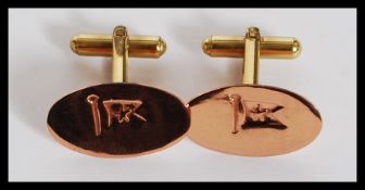 An unusual pair of gentlemans cufflinks crafted from the copper taken from the wreck of HMS White