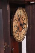 A 19th century large walnut cased vienna regulator wall clock in the manner of Gustav Becker.
