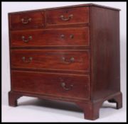 An early 19th century Georgian mahogany inlaid chest of drawers.