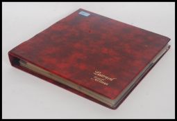 SAUCY SEASIDE; A collection of saucy seaside type postcards. Collection in red album of 170.