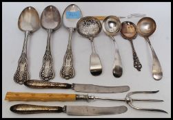 2 silver hallmarked handled Victorian knives together with large plated toasting fork, ladles,