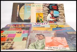 A collection of Long play Rock ' n ' Roll vinyl records to include Duanne Eddy $1,000,000.