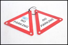 Two vintage style triangular ' No Parking ' signs.
