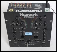 An  Numark DM1002 MK2 -  2 ChannelL Pro 3 Band  EQ DJ Mixer previously owned by a former Ministry