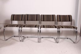 A set of 4 1970's chrome and fabric upholstered cantilever salon chairs.