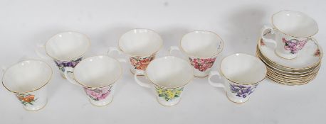 A collection of Staffordshire Royal Stratford ' Tea With The Queen Mother ' bone china teacups and