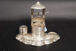 An unusual continental silver / white metal (stamped ' 750 ' to reverse ) desktop pen and ink set