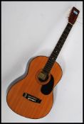 A six string Hohner acoustic Spanish style guitar,