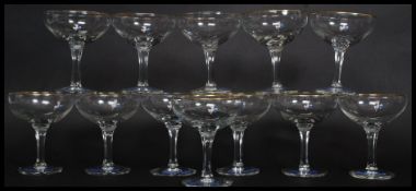 A set of twelve vintage /  retro collectable advertising Babycham glasses,
