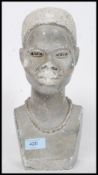 An African believed Zimbabwe carved stone bust of a Shona woman with beaded necklace.