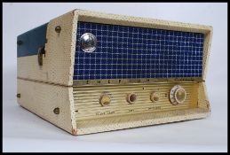 A vintage 1950's two tone Emerson Hi-Fidelity portable record player.