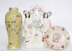 A Victorian Staffordshire flatback figurine diorama together with a Chinese famille juane vase and