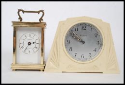A vintage mid century bakelite Ingersoll mantel clock together with a heavy Metamec carriage clock
