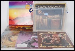 A collection of Long Play ( lp's ) vinyl records of various genres and artists such as Uriah Heep,