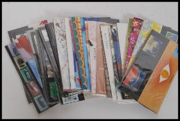 A collection of unmarked first day covers / issues stamps with a face value of approx £70