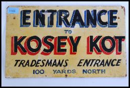 A vintage handpainted retro wooden sign for ' Kosey Kot ' tradesman entrance.