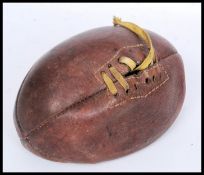An original 1950's (possibly earlier) all leather rugby ball,